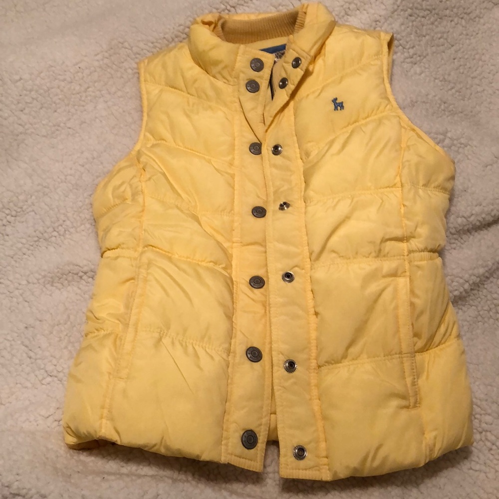 Yellow puffer vest